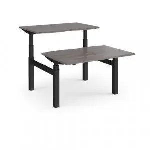Elev8 Touch sit-stand back-to-back desks 1200mm x 1650mm – black frame, grey oak top