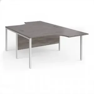 Maestro 25 back to back ergonomic desks 1400mm deep – white bench leg frame, grey oak top