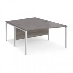 Maestro 25 back to back wave desks 1400mm deep – white bench leg frame, grey oak top