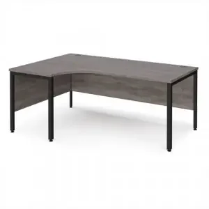 Maestro 25 left hand ergonomic desk 1800mm wide – black bench leg frame, grey oak top